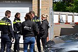 04-05-2019  Breda - In de wijk Tuinzigt is na melding van een chemische lucht een terrein met garageboxen afgezet. - Fotokrant