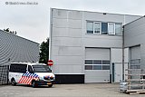 13-07-2019 Breda - Een 3 tal panden en de achteringang van de loodsen erachter werden  zwaar bewaakt. - Fotokrant