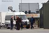 21-05-2019  Baarle Nassau - Omdat er ook een inval plaatsvond in Belgie was ook de belgische politie op het terrein in Nederland aanwezig. - Fotokrant