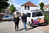 09-07-2019 Breda - Achter het voormalig cafe was de omgeving afgezet. Ook hier deed de recherche onderzoek. Er was een samenwerkingsverband met Europol en Eurojust. - Fotokrant