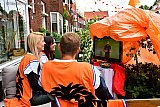 21-06-2021 Breda - Macedonie - Nederland EK kijken in de voortuin . De oranjefans zijn op de regen voorbereid en hebben de tv afgedekt met een oranje plastic. - Fotokrant