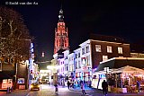 25-11-2021 Breda - Vanwege Orange The World is de Grote of Onze Lieve vrouwekerk van Breda heden avond oranje verlicht.  Binnen in de kerk vind de landelijke bijeenkomst plaats van geweld tegen vrouwen en meisjes.  - Fotokrant