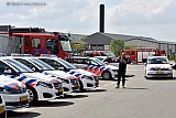 24-04-2019 Breda - De grote hoeveelheid politiewagens die netjes tegenover de loods op een rij geparkeerd stonden trokken de nodige aandacht. - Fotokrant