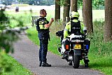 23-07-2020 Bavel -  In de directe omgeving  van de plaats delict waren ondanks het warme weer aan alle kanten van de pd langere tijd agenten met kogelwerende vesten te zien.  - Fotokrant