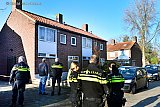 30-11-2019 Breda -Na de steekpartij werd de woning afgesloten en goed bewaakt. - Fotokrant