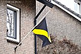 03-04-2022 Breda - Als protest tegen de overnameplannen van de City Football Group hebben NAC fans al dagen de NAC vlag half stok hangen aan hun woningen. - Fotokrant